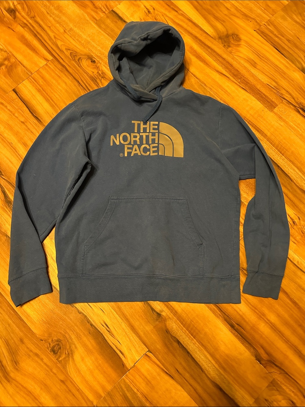 The North Face Slate Blue Hoodie with Gold Logo